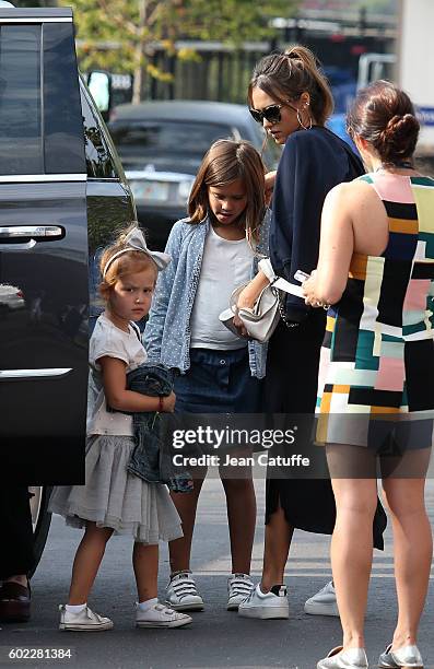 Jessica Alba and her daughters Honor Warren and Haven Warren arrive for the women's final at Arthur Ashe Stadium on day 13 of the 2016 US Open at...