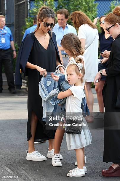Jessica Alba and her daughters Honor Warren and Haven Warren arrive for the women's final at Arthur Ashe Stadium on day 13 of the 2016 US Open at...