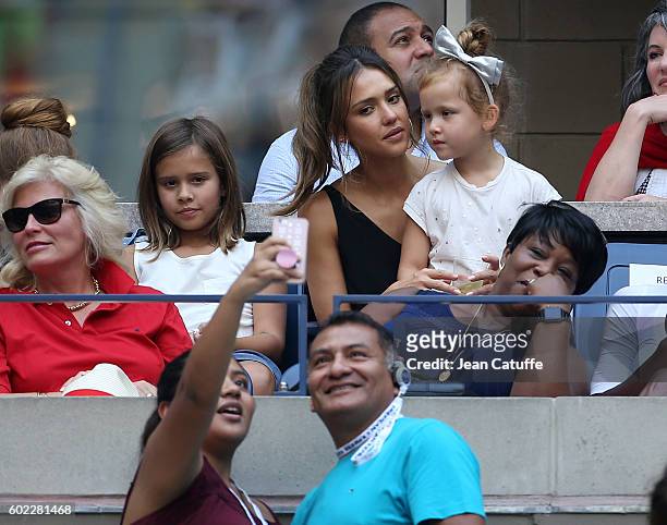 Jessica Alba and her daughters Honor Warren and Haven Warren attend the women's final at Arthur Ashe Stadium on day 13 of the 2016 US Open at USTA...