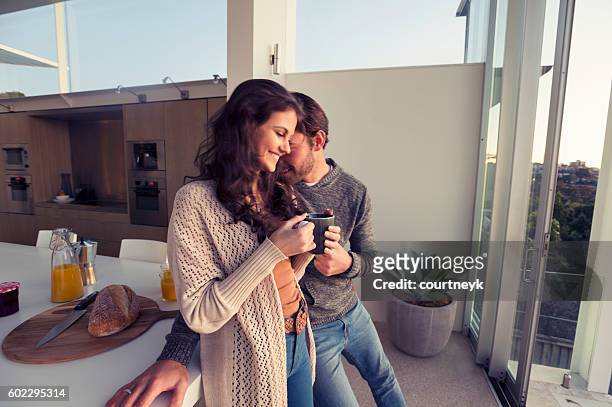 couple having breakfast together at home. - coffee on patio stock pictures, royalty-free photos & images
