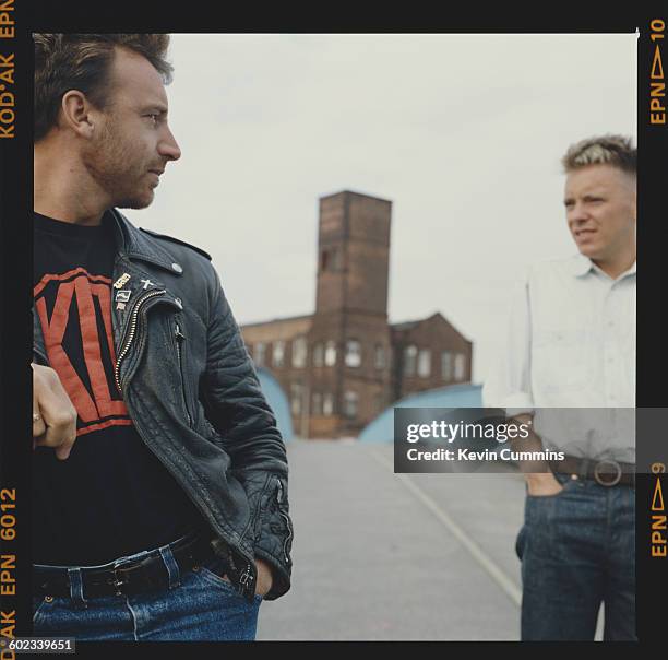 Peter Hook and Bernard Sumner of British rock group New Order, circa 1985.