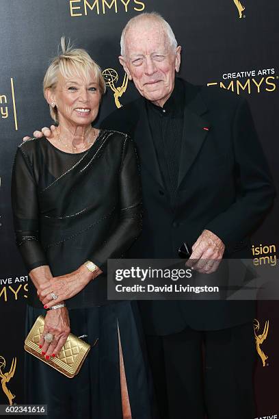 Actors Catherine Brelet and Max von Sydow attend the 2016 Creative Arts Emmy Awards Day 1 at the Microsoft Theater on September 10, 2016 in Los...