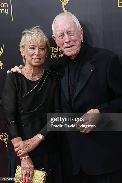 Actors Catherine Brelet and Max von Sydow attend the 2016 Creative Arts Emmy Awards Day 1 at the Microsoft Theater on September 10, 2016 in Los...