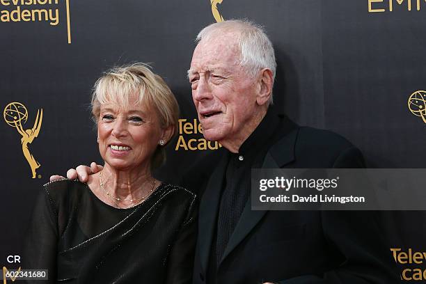 Actors Catherine Brelet and Max von Sydow attend the 2016 Creative Arts Emmy Awards Day 1 at the Microsoft Theater on September 10, 2016 in Los...