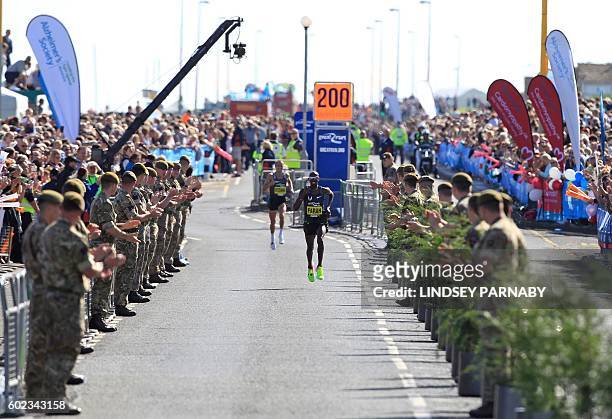 Britain's Mo Farah approaches the finish on his way to victory in the the men's elite race in the Great North Run half-marathon in South Shields,...