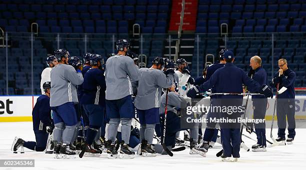 Team Europe players listen to Ralph Krueger's instructions during a practice at the Centre Videotron on September 7, 2016 in Quebec City, Quebec,...