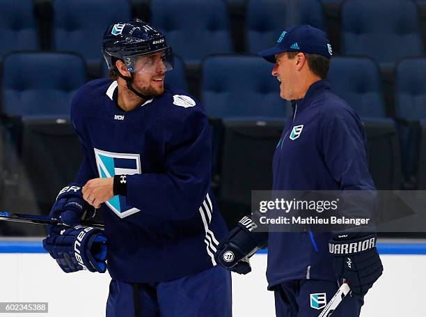 Anze Kopitar of Team Europe speaks with an assistant coach during a practice at the Centre Videotron on September 7, 2016 in Quebec City, Quebec,...