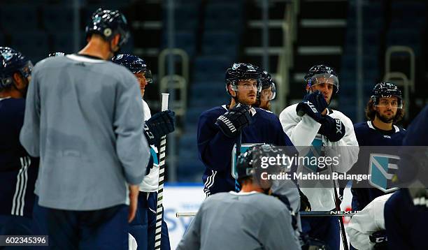 Team Europe players listen to Ralph Krueger's instructions during a practice at the Centre Videotron on September 7, 2016 in Quebec City, Quebec,...