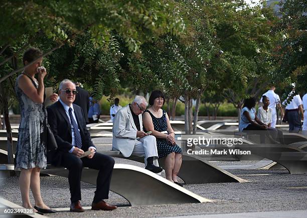 People visit the Pentagon's 9/11 Memorial Park, on September 11, 2016 in Arlington, Virginia. President Obama is scheduled to visit the Pentagon and...