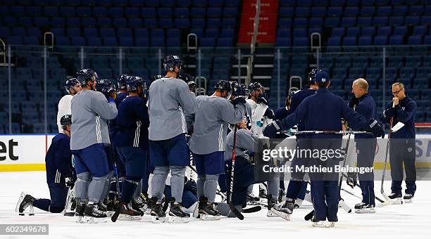 Team Europe players listen to Ralph Krueger's instructions during a practice at the Centre Videotron on September 7, 2016 in Quebec City, Quebec,...