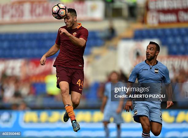 Roma's defender from Greece Kostas Manolas fights for the ball with Sampdoria's forward Fabio Quagliarella during the Italian Serie A football match...