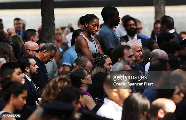 Family members, emergency workers and others attend a commemoration ceremony for the victims of the September 11 terrorist attacks at the National...