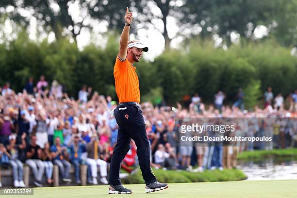 Joost Luiten of the Netherlands celebrates victory on the 18th green during the final round on day four of the KLM Open at The Dutch on September 11,...