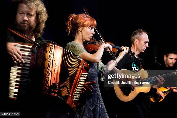 Spiro in concert at Sidmouth Folk Week in Sidmouth, Devon, UK, 4th August 2015. From left to right, they are Jason Sparkes on accordion, Jane Harbour...