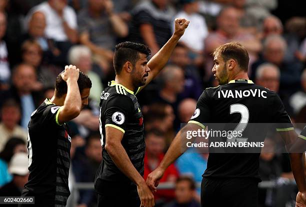 Chelsea's Brazilian-born Spanish striker Diego Costa celebrates after scoring the opening goal of the English Premier League football match between...