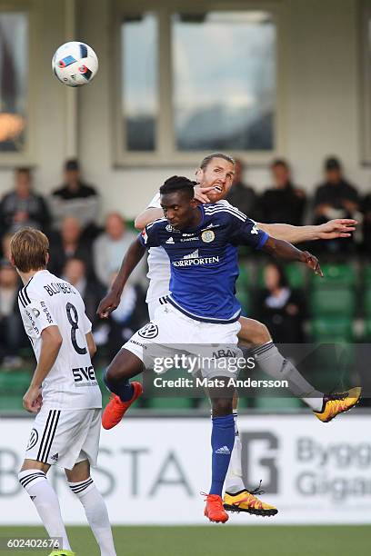 Nils-Eric Johansson of AIK and Peter Wilson of GIF Sundsvall during the Allsvenskan match between GIF Sundsvall and AIK at Norrporten Arena on...