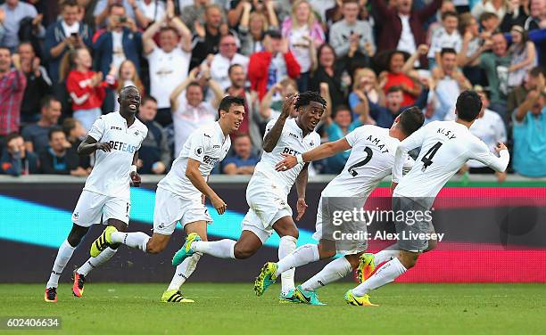 Leroy Fer of Swansea City celebrates with team mates as he scores their second goal during the Premier League match between Swansea City and Chelsea...