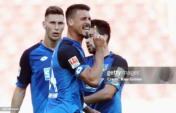 Sandro Wagner of Hoffenheim celebrates his team's first goal during the Bundesliga match between 1. FSV Mainz 05 and TSG 1899 Hoffenheim at Opel...