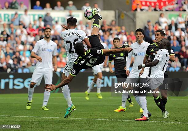 Diego Costa of Chelsea scores his second goal with a bicycle kick during the Premier League match between Swansea City and Chelsea at The Liberty...