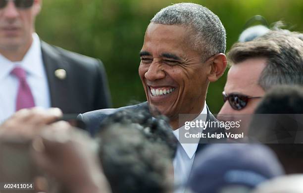President Barack Obama greets attendees after an observance ceremony at the Pentagon Memorial on the 15th anniversary of the 9/11 terror attacks on...