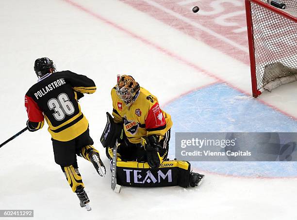 Jerry Pollastrone of Vienna Capitals and Eero Kilpelainen of KalPa Kuopio during the Champions Hockey League match between Vienna Capitals and KalPa...