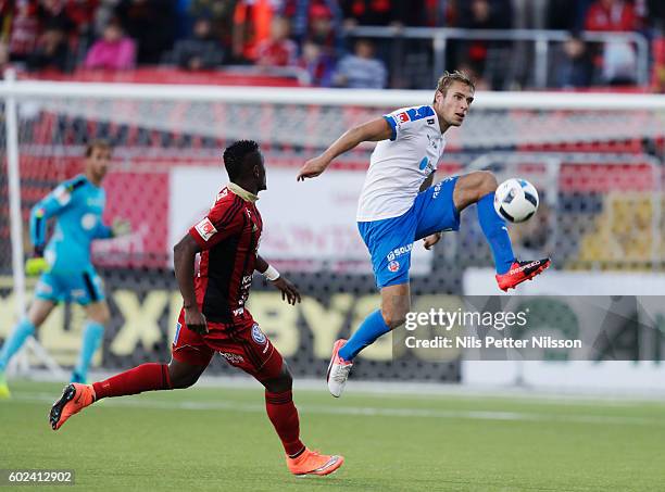 Frederik Helstrup Jensen of Helsingborgs IF and Alhaji Gero of Ostersunds FK during the Allsvenskan match between Ostersunds FK and Helsingborgs IF...