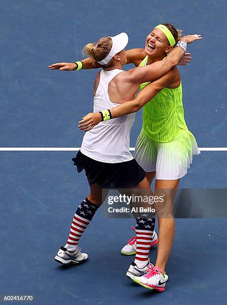 Bethanie Mattek-Sands of the United States and Lucie Safarova of the Czech Republic celebrate defeating Caroline Garcia and Kristina Mladenovic of...