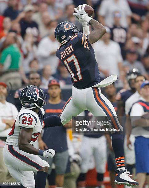 Alshon Jeffery of the Chicago Bears makes a catch against Andre Hal of the Houston Texans in the second quarter at NRG Stadium on September 11, 2016...