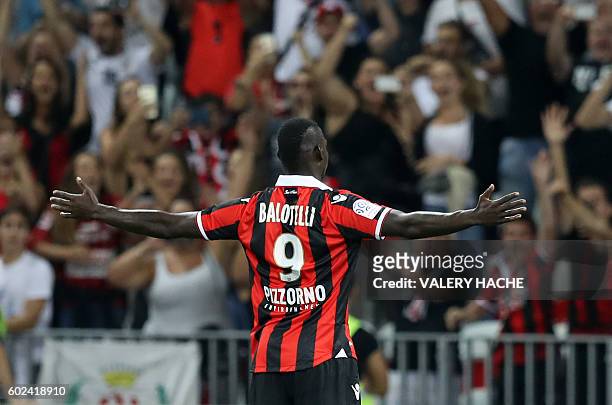 Nice's Italian forward Mario Balotelli celebrates after scoring a goal during the French L1 football match OGC Nice vs Olympique de Marseille on...