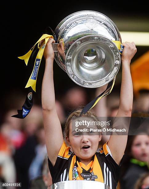 Dublin , Ireland - 11 September 2016; Michelle Quilty of Kilkenny lifts the O'Duffy Cup after the Liberty Insurance All-Ireland Senior Camogie...