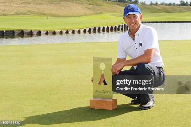 Magnus P Atlevi of Sweden poses with the trophy after the final round of the Paris Legends Championship played on L'Albatros Course at Le Golf...