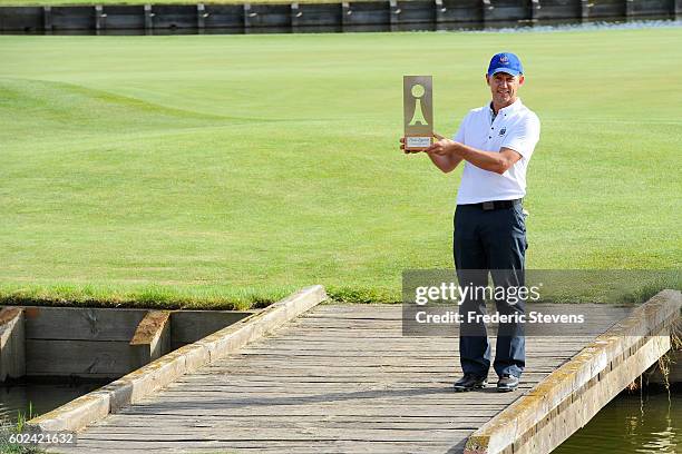 Magnus P Atlevi of Sweden poses with the trophy after the final round of the Paris Legends Championship played on L'Albatros Course at Le Golf...