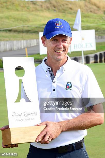 Magnus P Atlevi of Sweden poses with the trophy after the final round of the Paris Legends Championship played on L'Albatros Course at Le Golf...