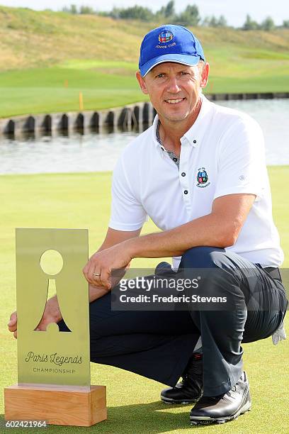 Magnus P Atlevi of Sweden poses with the trophy after the final round of the Paris Legends Championship played on L'Albatros Course at Le Golf...
