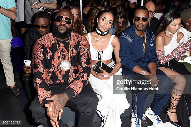 Rick Ross, Regina Perera and Juicy J attends the Hood By Air fashion show during New York Fashion Week: The Shows at The Arc, Skylight at Moynihan...