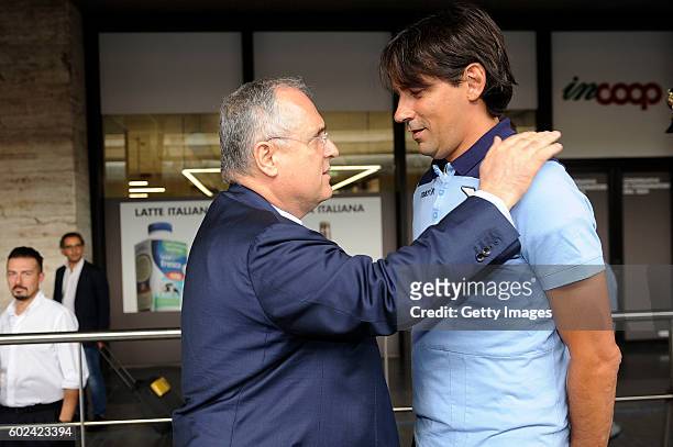 President Claudio Lotito cheers coach Simone Inzaghi before leaving for Verona ahead of the Serie A match between AC ChievoVerona on September 10,...