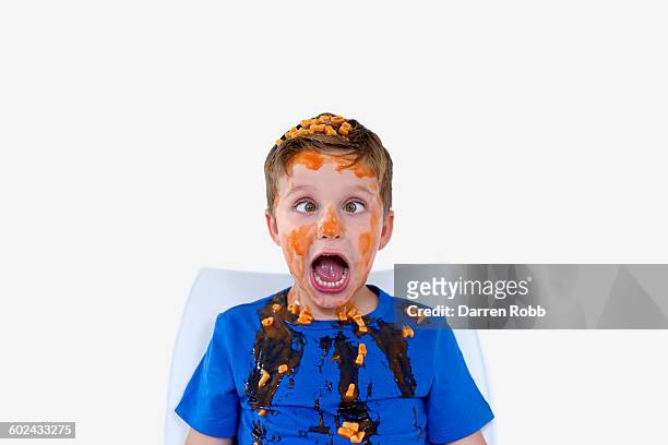 boy covered with alphabet spaghetti - ugly boys fotos stock-fotos und bilder