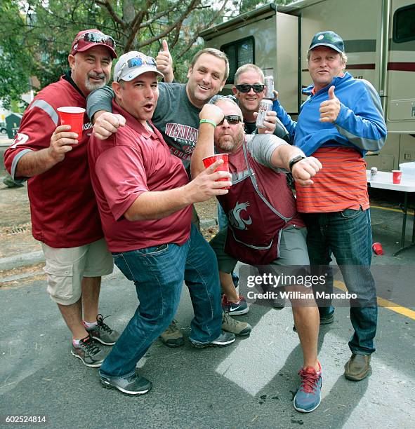 Fans for the Washington State Cougars rally for their team in the tailgaiting section prior to the game against the Eastern Washington Eagles at...