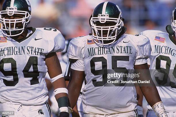 Josh Shaw of the Michigan State Spartans walks on the field with teammates during the game against the Notre Dame Fighting Irish at the Notre Dame...