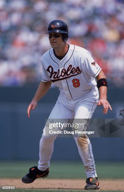 Cal Ripken Jr. #8 of the Baltimore Orioles leading off the base during the game against the Kansas City Royals at Oriole Park at Camden Yards in...