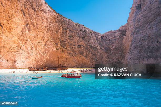 smuggler's boat - agios georgios church stock pictures, royalty-free photos & images