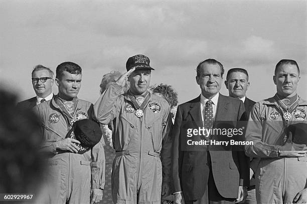 President Richard Nixon meets the Apollo 13 astronauts in Honolulu, Hawaii, after their safe return to Earth, 23rd April 1970. From left to right...