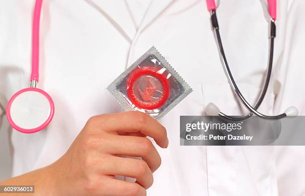 doctor with condom - condom bildbanksfoton och bilder