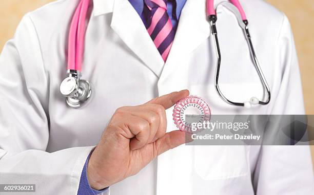 doctor with hrt pills - menopausa foto e immagini stock