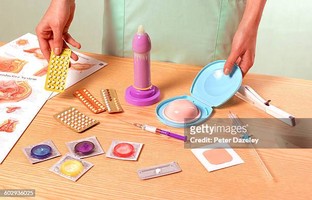 school nurse giving sex education - erotik stock-fotos und bilder