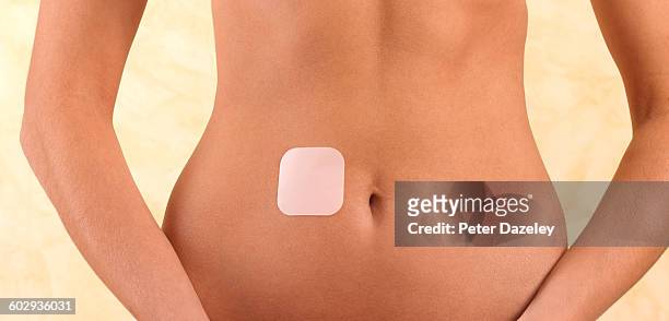 latin american woman with contraceptive patch - contraceptive patch fotografías e imágenes de stock