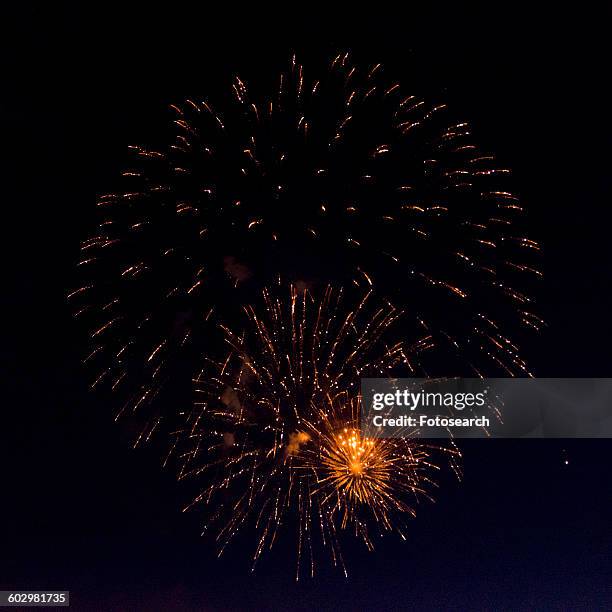 fireworks display at night on canada day - kenora stockfoto's en -beelden