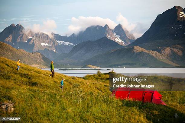 mother with children camping - northern norway stock-fotos und bilder