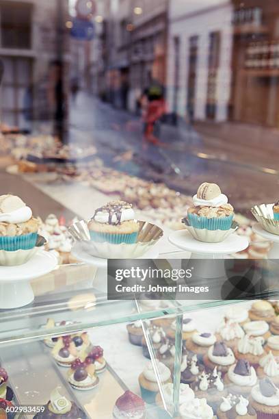 cupcakes - bakery window stock pictures, royalty-free photos & images