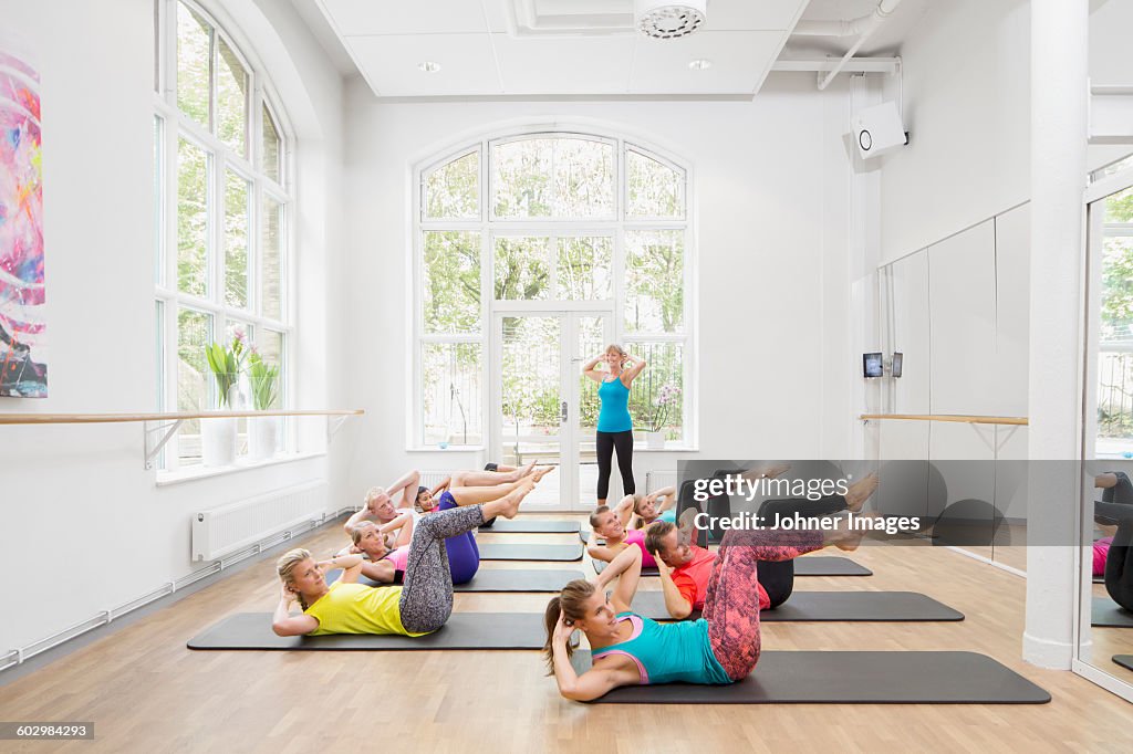Group of people exercising in fitness class